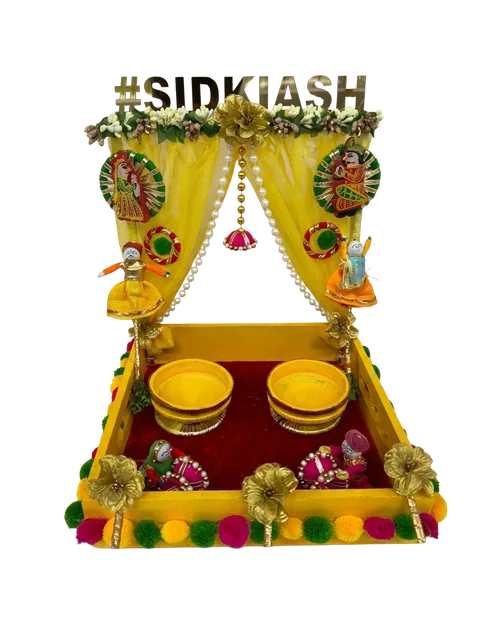 Yellow haldi platter with two bowls and a personalised topper.