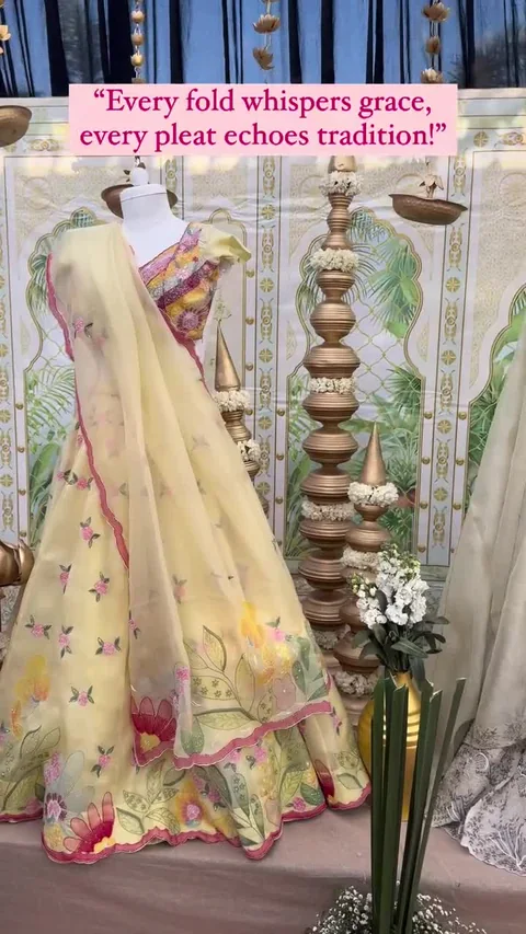 A floral outfit draped for presentation, from supplied event footage