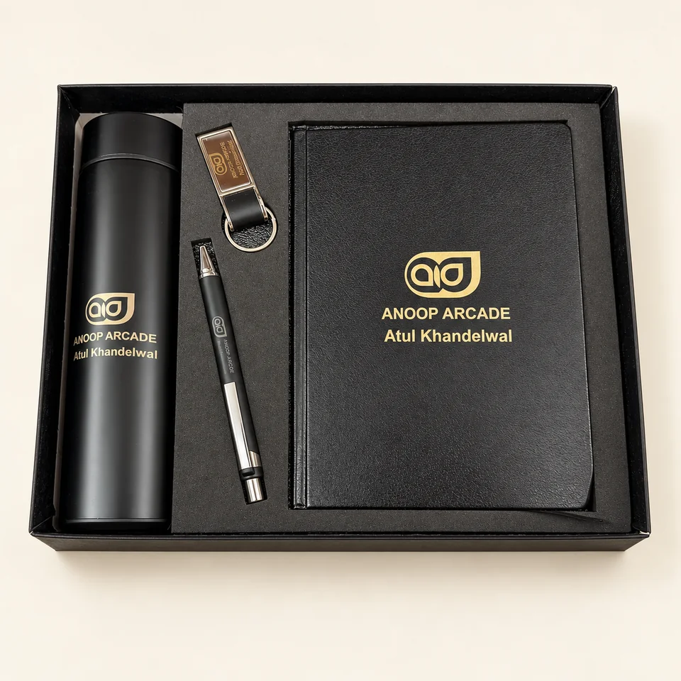 Anoop Arcade bottle, diary, pen and keyring from a supplied order; background and lighting refined.