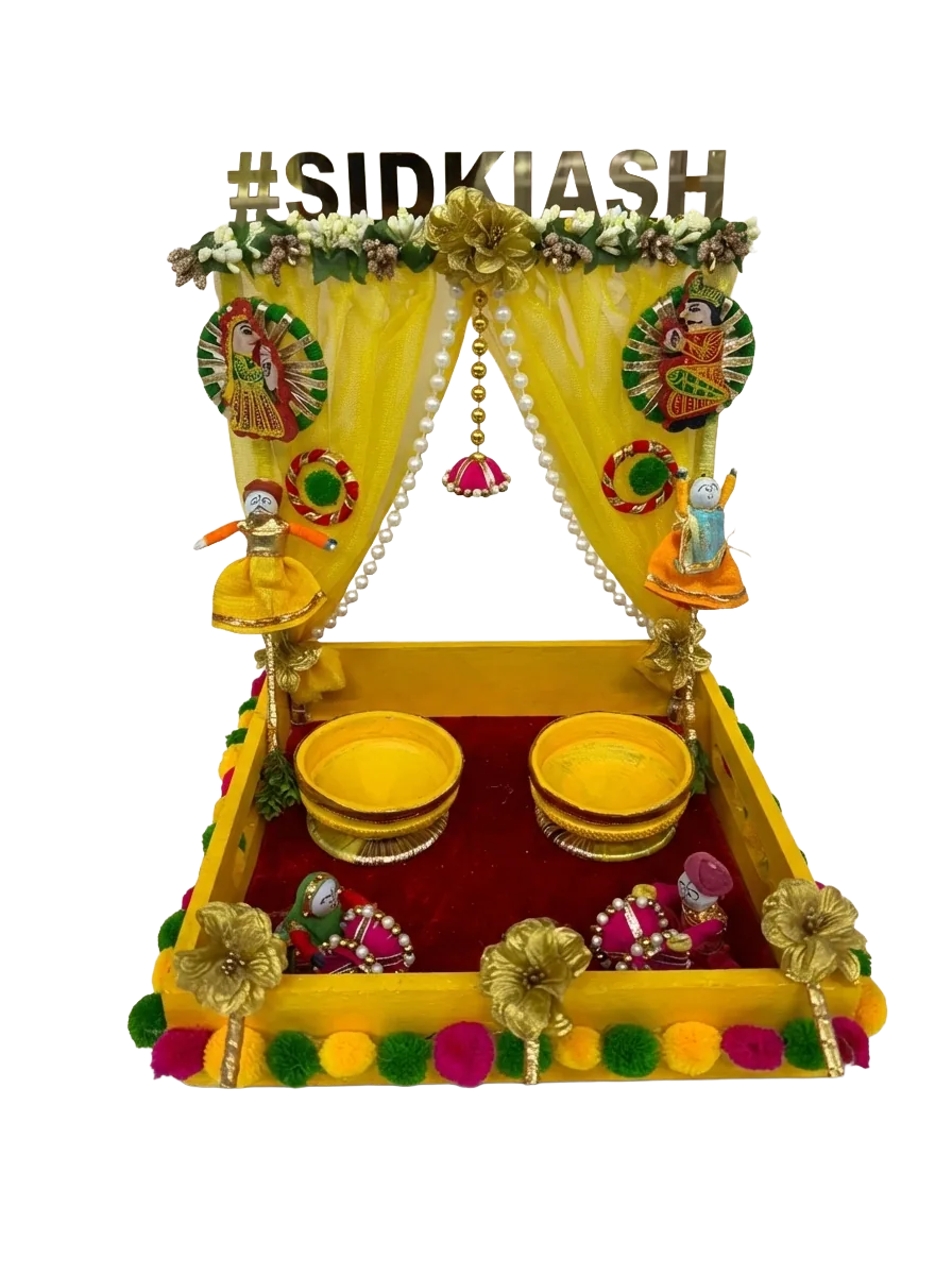 Yellow haldi platter with two bowls and a personalised topper.